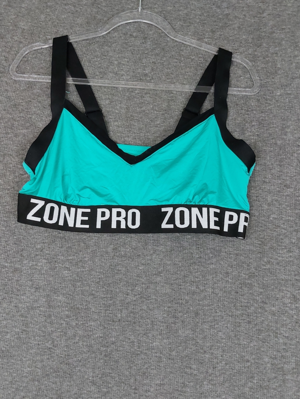ZONE PRO WOMENS AQUA BLUE BLACK TRIM SPORTS PULLOVER STYLE BRA SIZE 2X 36C